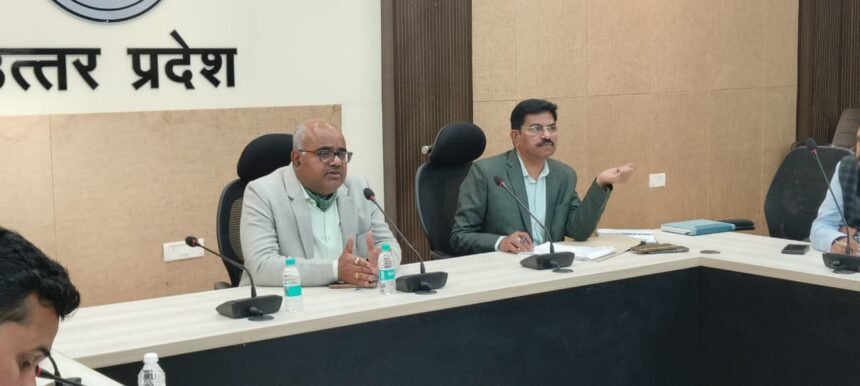 DM Kanpur Jitendra Pratap Singh meeting on Ayushman Card progress.